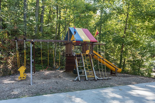 Playground for guests at Lakeview Point, a 2 bedroom cabin rental located in Douglas Lake